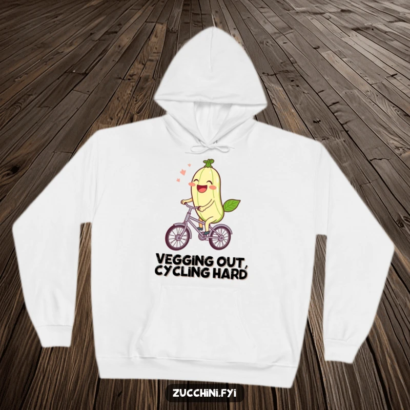 Funny Hoodie: A laughing kawaii zucchini rides a miniature bicycle, offering cozy and cheerful vegetable humor.