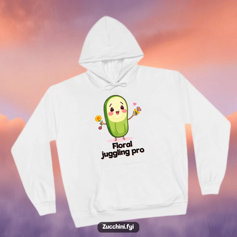 Funny hoodie with a delighted zucchini slice character mastering the art of juggling small, vibrant edible flowers, the ultimate cozy comedy wear.