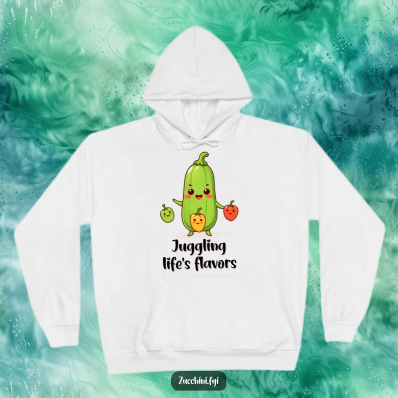 Funny Zucchini Hoodie showcasing a beaming zucchini skillfully juggling three smiling miniature peppers, designed for comfort and humorous appeal.