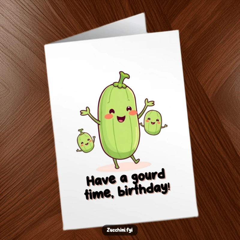 Funny Free Printable Birthday Card showing a smiling zucchini with tiny legs juggling three smaller smiling zucchinis, celebrating a fruitful year.