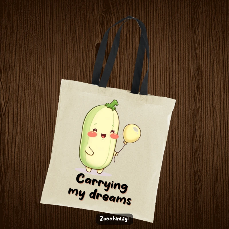 Funny tote bag featuring a delighted zucchini with rosy cheeks, holding a minuscule balloon, ready for charming grocery runs.